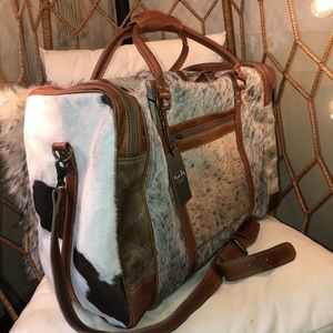 Cowhide duffle bag